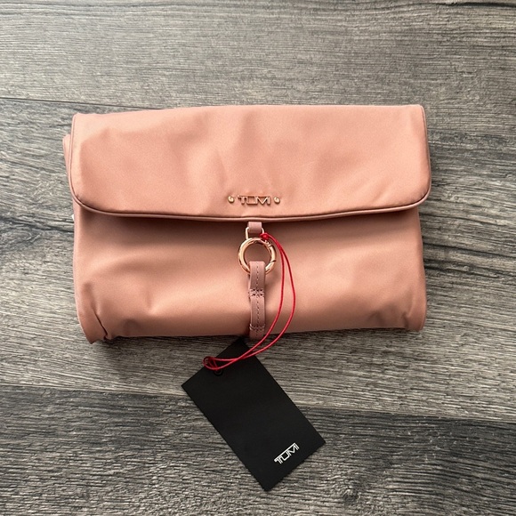 Tumi Handbags - NWT Tumi Eliza Jewelry Travel Roll Bag with Gold Hardware